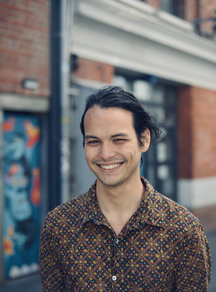 Young and intelligent lawyer, smiling and commenting on Housing 