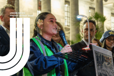 Union News graphic dated Friday 29 May 2026. A young Pasifika woman with a white flower behind her ear, wearing a hi-vis vest over a denim jacket, speaks into a microphone at a podium outside Parliament at night. People stand behind her.
